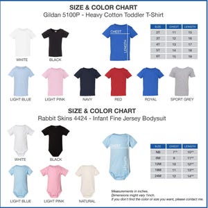 The image is a size and color chart for a Gildan 500p heavy cotton toddler t-shirt. It displays various sizes and colors, including white, black, pink, navy, red, royal, light blue, light pink, natural, and sport grey. The chart provides measurements for each size and color, and it includes a rabbit skins 4424-infant fine jersey bodysuit.