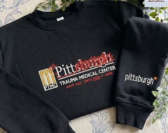The Pitt PTMC: Pittsburgh Trauma Medical Center Embroidered Hooded Sweatshirt, The Pitt Merch