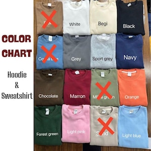 May include: A color chart of hoodies and sweatshirts in various colors, including white, grey, navy, orange, and light pink. The text "COLOR CHART" and "Hoodie & Sweatshirt" are displayed. Some colors have an "X" over them.