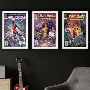 May include: Three framed comic book style prints featuring basketball legends. The prints showcase dynamic action poses and bold text, including "Air Jordan," "The Black Mamba," and "King James." Each print has a unique color scheme and comic book style.
