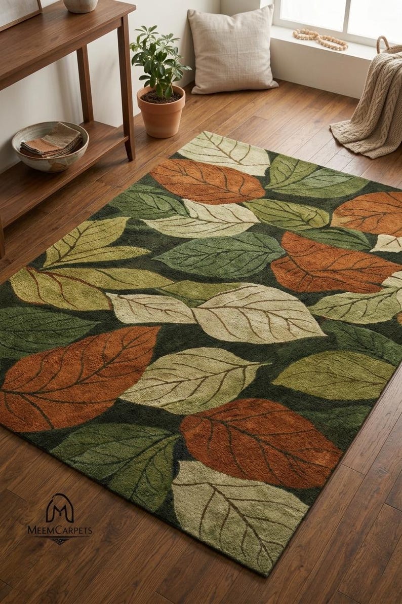 Botanical leaf pattern rug in green and earthy tones for living room
