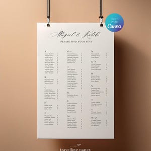 May include: A cream-colored wedding seating chart with the names Abigail & Kaleb at the top. The text "PLEASE FIND YOUR SEAT" is below the names. The names are listed alphabetically with table numbers.