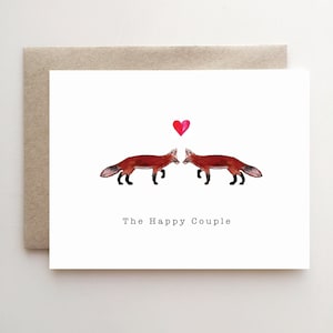 La pareja feliz - con 2 zorros y corazón