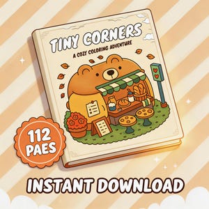 May include: A coloring book titled Tiny Corners: A Cozy Coloring Adventure featuring a cartoon bear-shaped bakery stall with bread, stools, and a sign with two hearts. An orange scalloped badge on the cover displays the text 112 PAES.