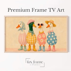 May include: A framed digital print titled Premium Frame TV Art featuring four ducks wearing colorful clothing and rain boots. The ducks are dressed in striped, checkered, floral, and polka-dot patterns with accessories like hats and glasses.