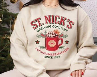 St. Nick’s Brewing Company Christmas Sweatshirt, North Pole Hot Cocoa Hoodie, Christmas Coffee & Bakery Holiday Sweater.