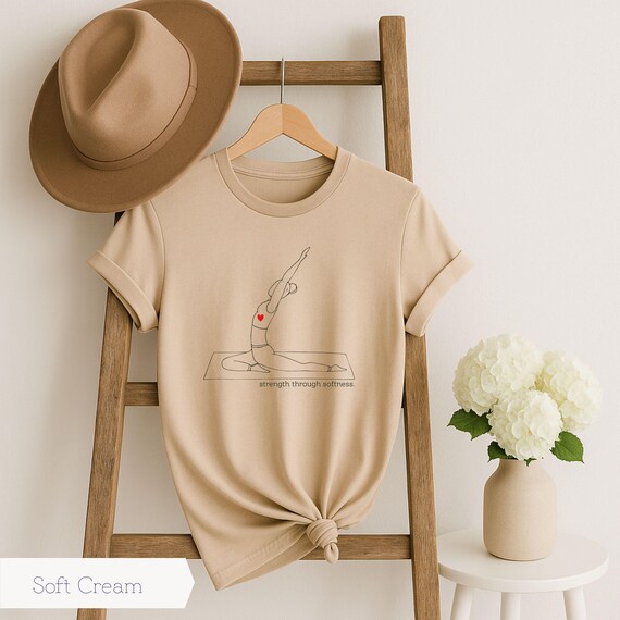 Minimalist Yoga Shirt “Strength Through Softness” – Bella Canvas 3001 Soft Cotton Tee, Mindful Movement Top, Neutral Yoga Graphic T-Shirt
