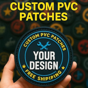 May include: A round, dark blue PVC patch with the text "CUSTOM PVC PATCHES" in yellow. The patch features a design area for "YOUR DESIGN" and the words "FREE SHIPING" in white. The patch is held in a hand.