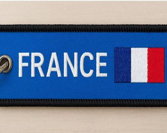 Niestandardowe breloczki z haftem wykonane dla Chloé Souris.