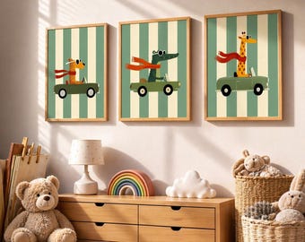 May include: Three framed art prints featuring cartoon animals in cars. A giraffe, a crocodile, and a giraffe are each driving a green car with a red scarf. The background has green and white vertical stripes. The frames are light brown.