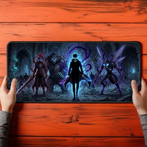 May include: A rectangular desk mat featuring a dark fantasy illustration of a central figure surrounded by a red-armoured knight, a large bear, and a winged insectoid creature, all set against a stone dungeon background with blue glowing accents.