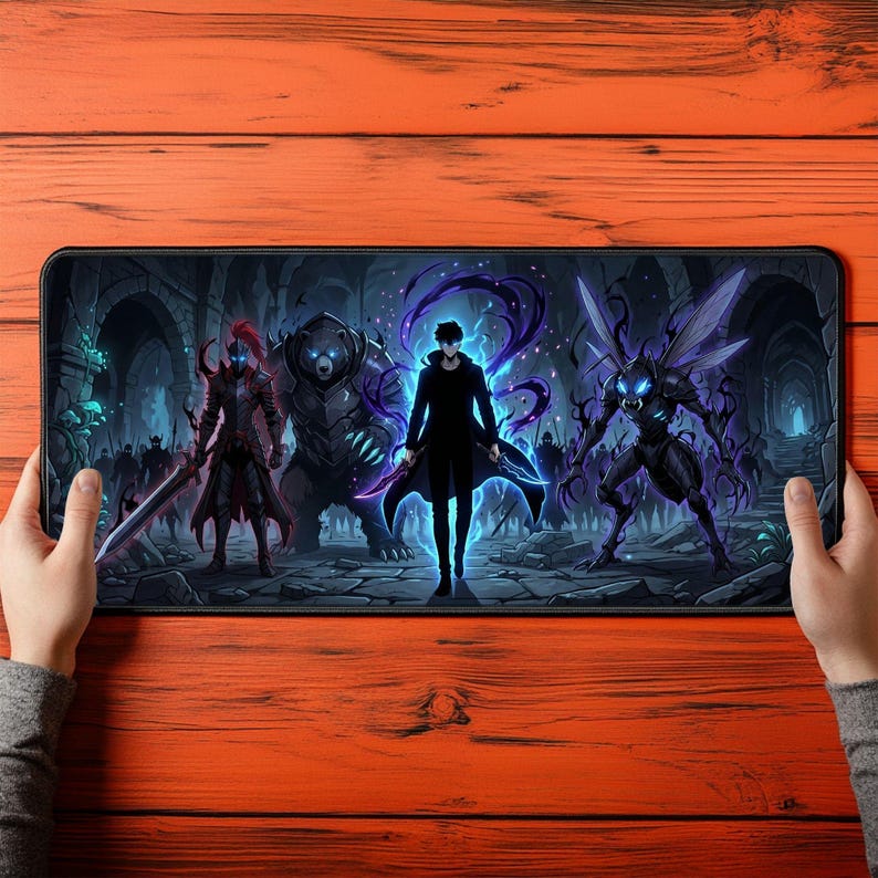 May include: A rectangular desk mat featuring a dark fantasy illustration of a central figure surrounded by a red-armoured knight, a large bear, and a winged insectoid creature, all set against a stone dungeon background with blue glowing accents.