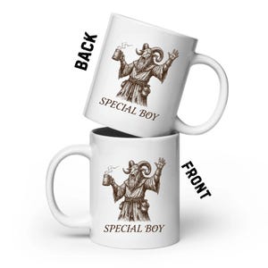 May include: Two white ceramic mugs stacked, each with a brown illustration of a goat-like figure holding a mug of beer. The text "SPECIAL BOY" is below the illustration. The word "BACK" is printed on one mug and "FRONT" on the other.
