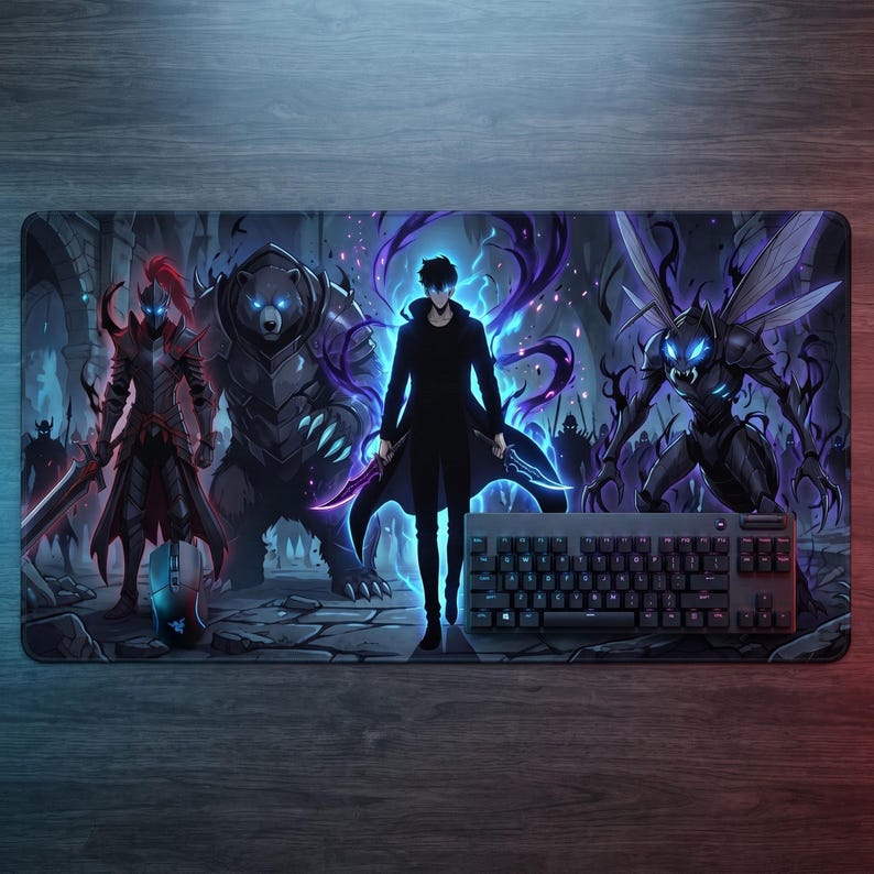 May include: A rectangular desk mat featuring a dark fantasy illustration of a central figure in a black coat flanked by a knight in red armour, a large bear, and a winged creature, with a black computer keyboard and mouse placed on top.