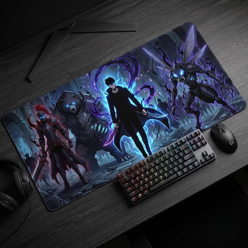 May include: A rectangular desk mat featuring a dark fantasy illustration of a central figure in a black coat surrounded by a glowing blue aura, a large bear, a red-armored knight, and a winged insectoid creature against a shadowy background.