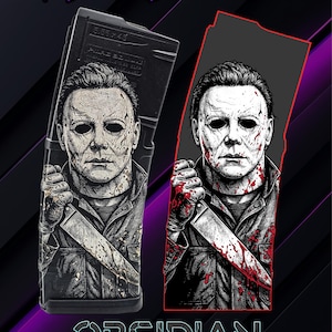 May include: Black magazine with a graphic of a masked figure holding a bloody knife. The text "Digital Lightburn file" is at the top, and "Obsidian Lasering" is at the bottom.