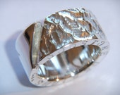 925 Sterling Silver Rustic ring With Angel Wing Surface and Unique Slashed Band Design