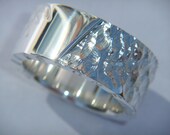 Handmade Chunky Silver Ring with a Angel Wing Design. Perfect Silver Wedding Band