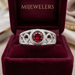 Anello con rubino rosso, taglio rotondo, in argento, con nodo celtico, fascia Art Déco per lei.