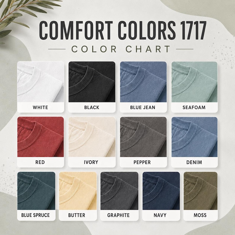 May include: A Comfort Colors 1717 color chart displaying twelve fabric swatches in white, black, blue jean, seafoam, red, ivory, pepper, denim, blue spruce, butter, graphite, navy, and moss, each labeled with its corresponding color name.