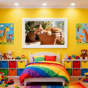 May include: A child's bedroom with a white bed, rainbow bedding, and colorful storage bins. A framed picture of an orange tabby cat in a flower pot hangs above the bed. Additional decor includes stuffed animals and children's artwork.