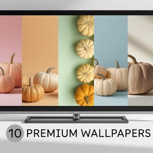 May include: A flat-screen TV displays a collection of 10 premium wallpapers featuring pumpkins. The pumpkins vary in color, including shades of orange, cream, and peach, against a backdrop of pastel hues. The text "10 PREMIUM WALLPAPERS" is displayed at the bottom.