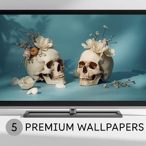 Puede incluir: Dos calaveras humanas adornadas con flores blancas y ramitas verdes sobre un fondo turquesa. Las calaveras son el punto focal, con el texto "5 PREMIUM WALLPAPERS" en la parte inferior de la pantalla.