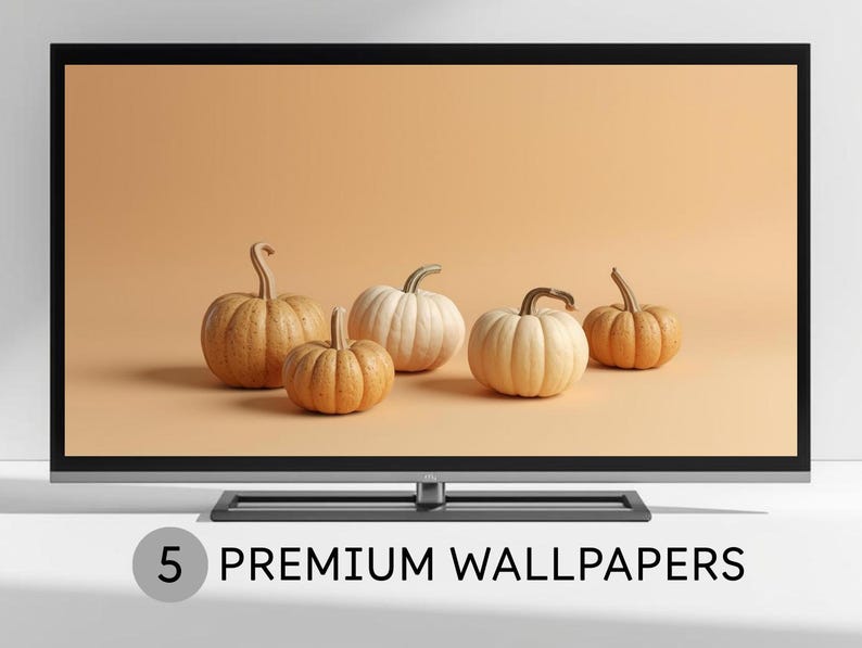 Puede incluir: Una pantalla de televisi&oacute;n muestra cinco calabazas en tonos naranja y blanco sobre un fondo melocot&oacute;n. Las calabazas tienen superficies texturizadas y tallos curvos. El texto "5 PREMIUM WALLPAPERS" est&aacute; en la parte inferior.