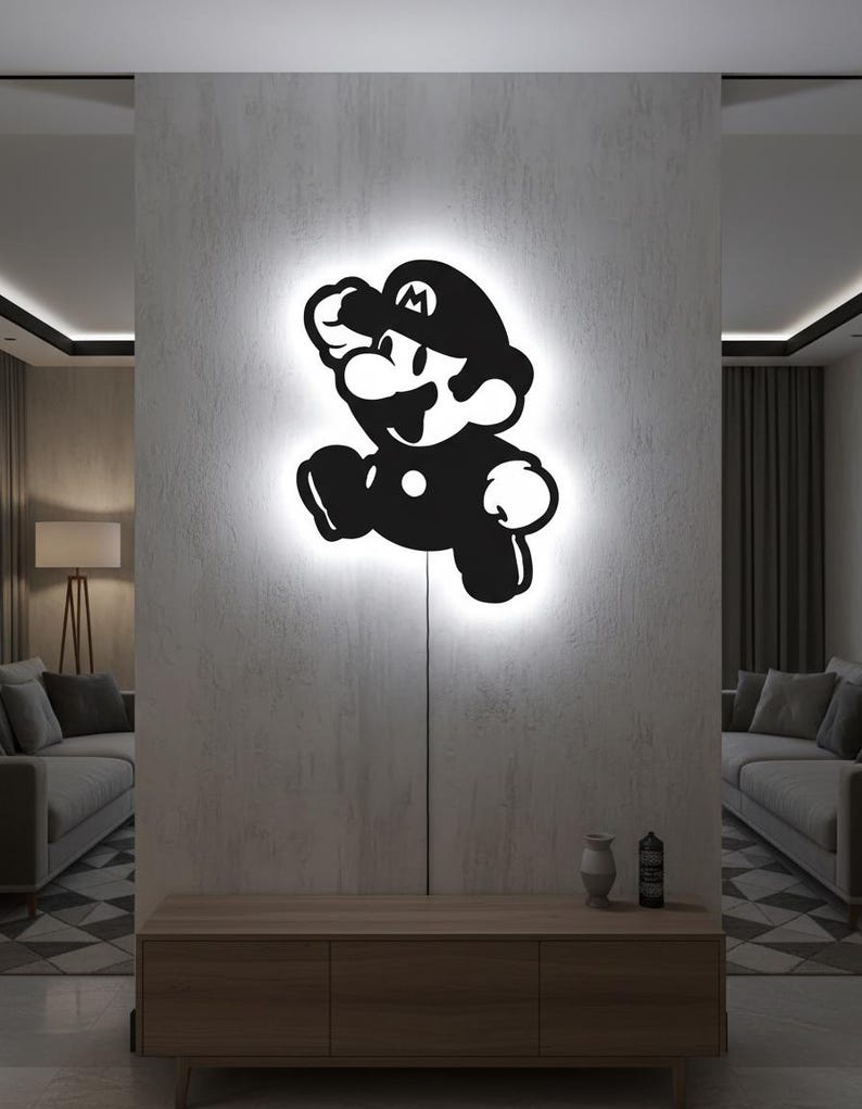 K&ouml;nnte beinhalten: Schwarz-wei&szlig;e Wandkunst des Videospielcharakters Mario in einer Laufpose. Das Kunstwerk wird von einem wei&szlig;en Licht beleuchtet, wodurch eine leuchtende Kontur entsteht. Die Kunst ist an einer grauen Wand angebracht.