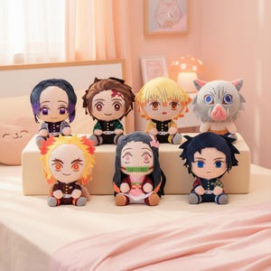 May include: Seven plush dolls of anime characters with unique hairstyles and clothing. The dolls, with large eyes, are arranged on a beige surface. The colour scheme includes black, brown, yellow, and pink.