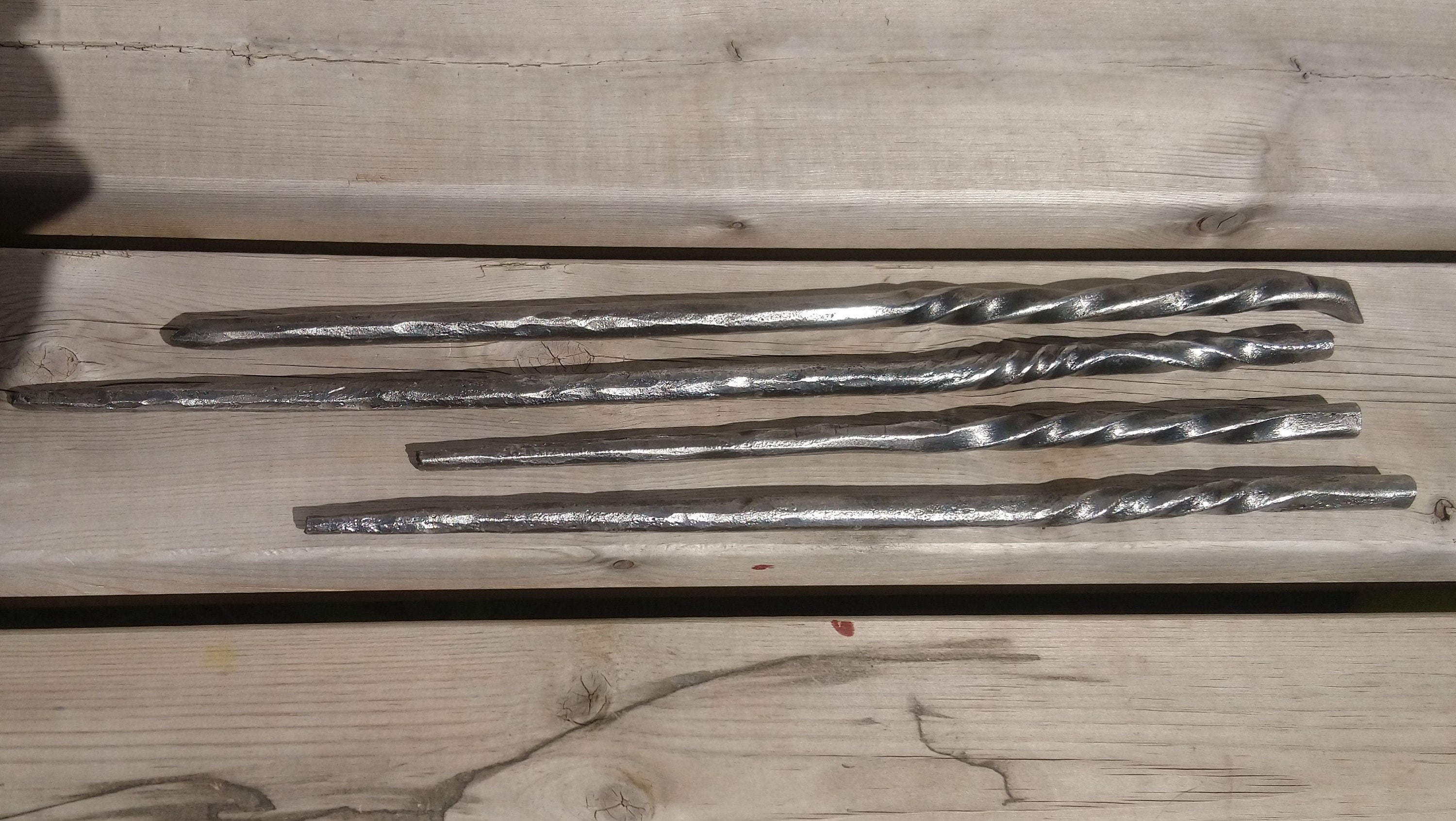 Hand forged metal magic wand.