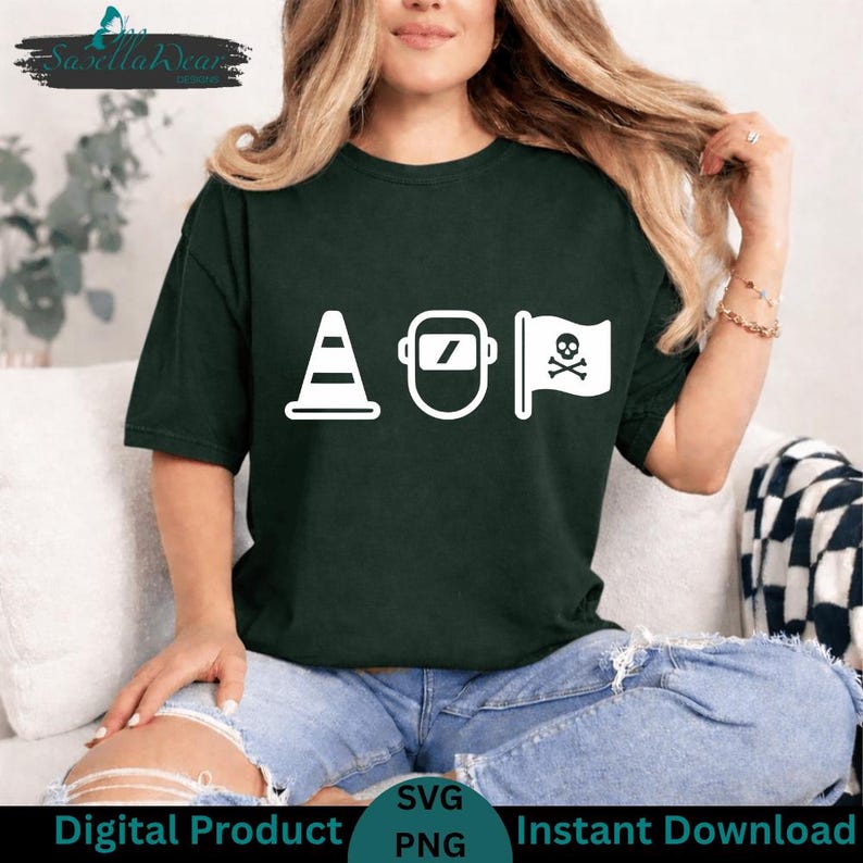 May include: Dark green t-shirt with a white graphic featuring a traffic cone, a welding mask, and a pirate flag. The shirt has short sleeves and a crew neck. The words "Digital Product", "SVG", "PNG", and "Instant Download" are at the bottom.