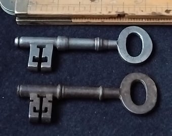 2 Door keys circa 1920s for the older locks can be altered to fit your locks
