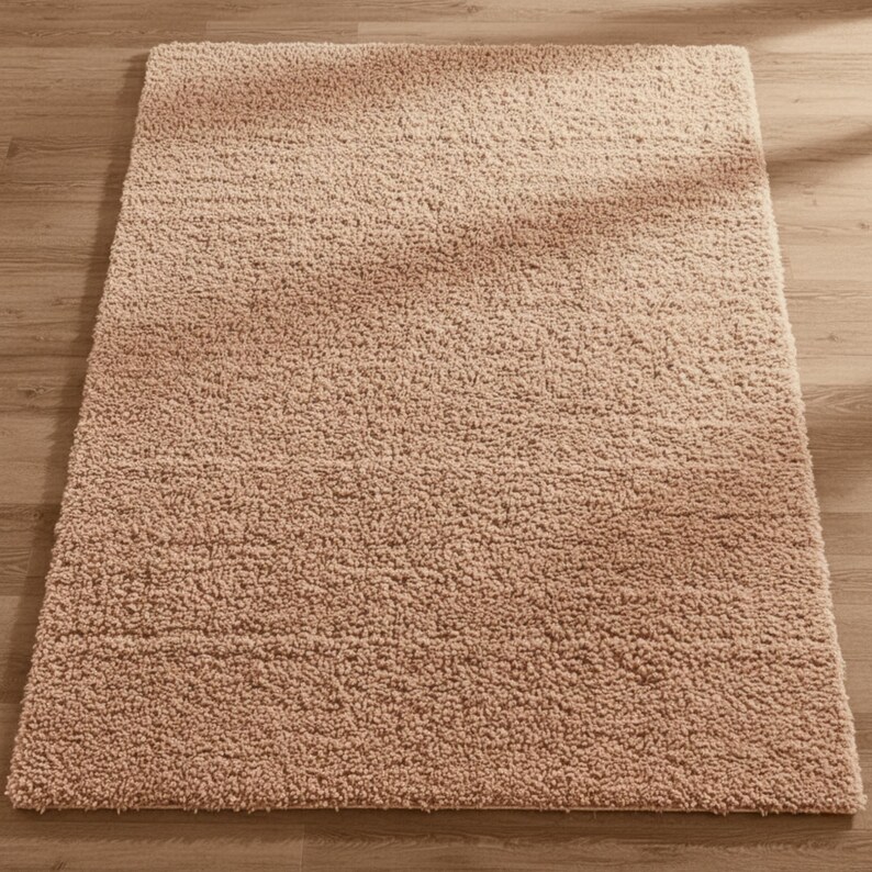 Mustard hand-tufted shag rug in a modern living room; soft yellow solid-color wool rug on light wood floor.