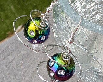 Shimmery Purple, Blue and Green Planet-like dangle earrings