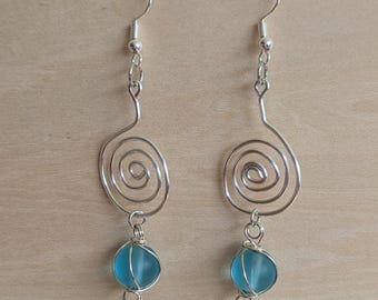 Silver Swirl Earrings with light Blue Glass bead