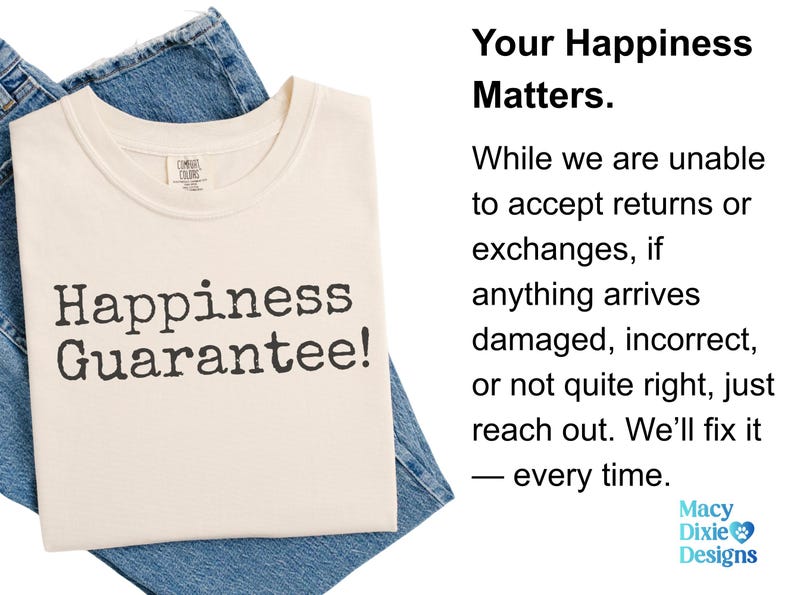 Puede incluir: Camiseta color crema con el texto "Happiness Guarantee!" en negro, sobre mezclilla azul. La camiseta tiene cuello redondo y una etiqueta peque&ntilde;a. La imagen tambi&eacute;n incluye texto sobre la satisfacci&oacute;n del cliente.
