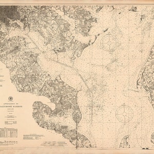 May include: A vintage nautical chart of the approaches to Baltimore Harbour, Maryland. The chart is printed in black and white on a cream-coloured paper. The chart shows the coastline, waterways, and depths of the harbour. The chart is dated June 1911.
