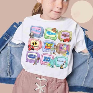Vintage Disney Pixar Classics Tee | Multi-Movie Graphic Shirt (Nemo, Lightning McQueen, Woody, Remy, Carl) Hoodie image 6