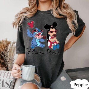 May include: A rustic wooden sign with the text "Welcome to our home" in white lettering. The sign features a distressed finish and a simple, inviting design, perfect for entryway decor.