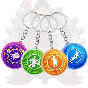 Peut inclure: Quatre porte-clés circulaires avec anneaux et chaînes en métal. Le violet présente un graphique d'étiquette de solde, le vert montre une bouteille barrée, l'orange représente une personne qui boit et le bleu montre deux silhouettes.