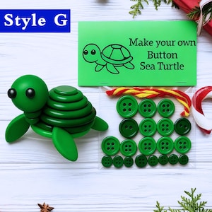 May include: A green turtle craft kit with the text "Make your own Button Sea Turtle." The kit includes a green turtle model, a variety of green buttons, and a yellow and red string. The words "Style G" are in a blue box.