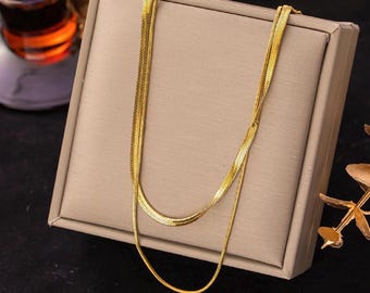 Collier chaîne en or serpent