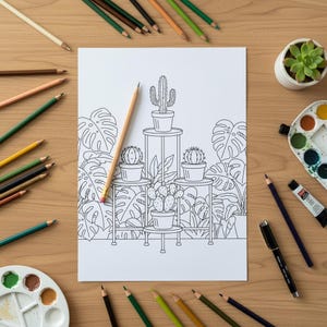Op de afbeelding: Een kleurplaat met een lijntekening van cactussen in potten op standaards, omringd door bladeren. Een potlood ligt op de pagina, met kleurpotloden, een vetplant en schildersbenodigdheden.