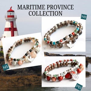 May include: The image displays the "Maritime Province Collection" with three beaded bracelets. Each bracelet features colourful gemstones and a silver charm. The background includes a lighthouse and coastal scenery. The bracelets are labelled "NB", "NS", and "PEI".