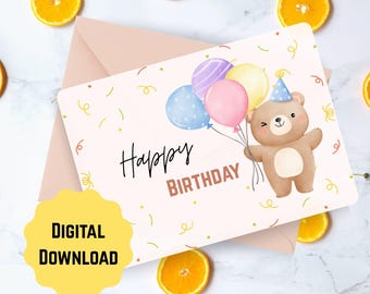 May include: A birthday card with a cartoon bear holding balloons. The card says "Happy Birthday" and "Digital Download". The card is light pink with colorful balloons and confetti. Oranges and grapefruit slices surround the card.