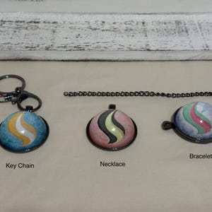Evolution Crystal Pendant (Customizable)
