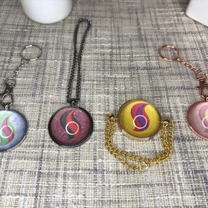 Collier, bracelet ou porte-clés en cristal Evolution (personnalisable)