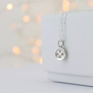 Handmade silver button necklace, small 4 hole button. image 1