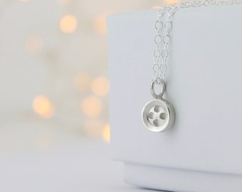 Handmade silver button necklace, small 4 hole button.